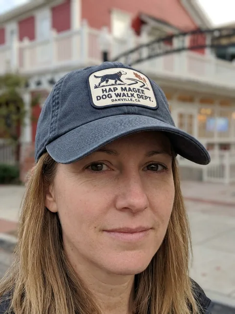 Digital visualization of Hap Magee Dog Walk Dept. on a cap