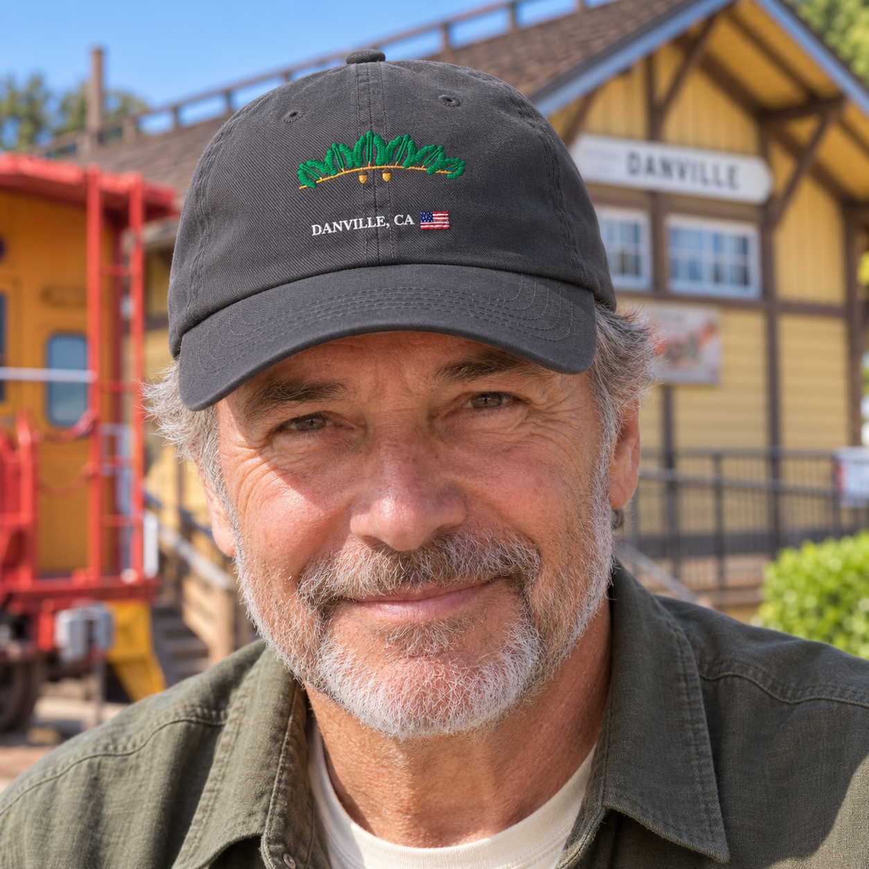 Oak and Flag cap worn by a man at the Danville depot — digital product visualization