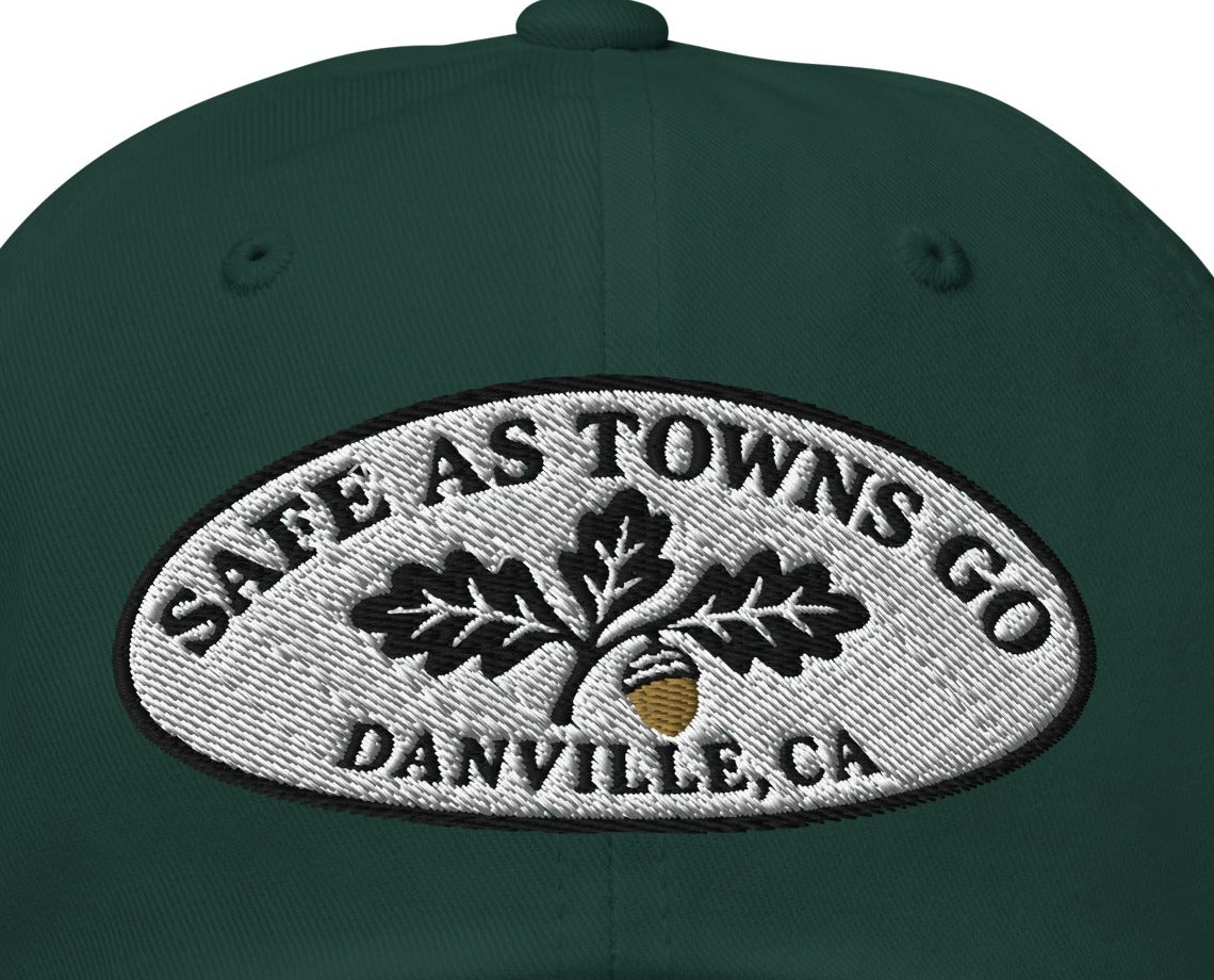 Safe as towns go cap in Spruce, embroidery detail