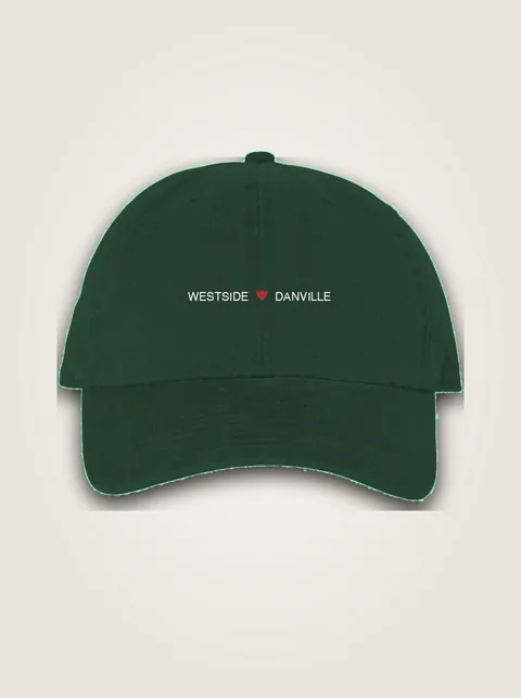 Studio product flat lay of Westside ❤️ Danville Youth Cap on authentic supplier blank