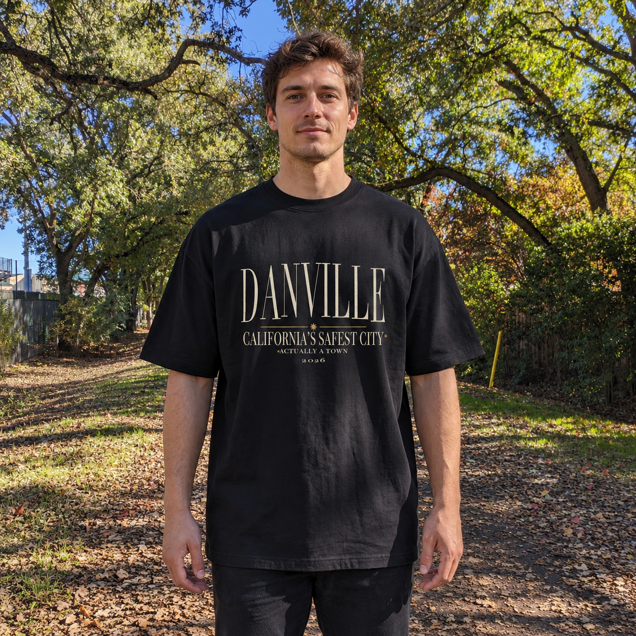 Safest city, actually a town Oversized tee in Black worn on the Iron Horse Trail — digital product visualization