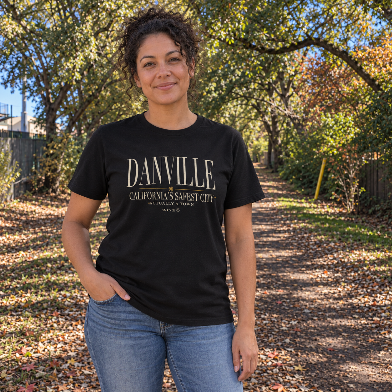 Safest city, actually a town Organic tee in Black, Iron Horse Trail model scene 2 — digital product visualization