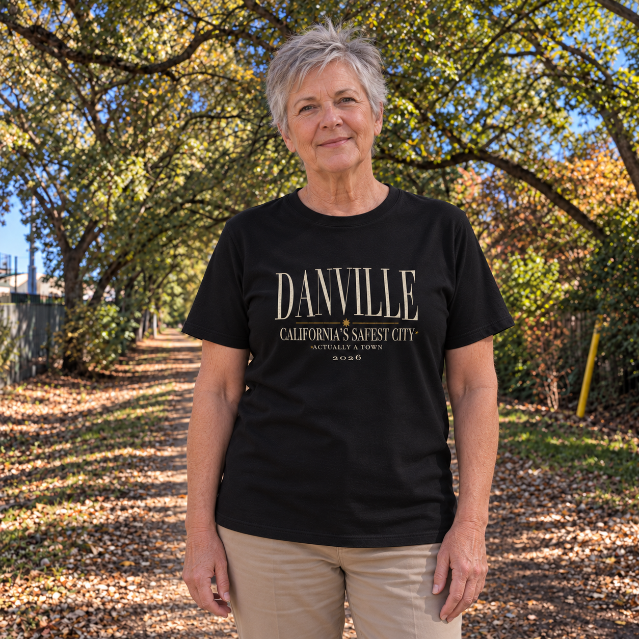 Safest city, actually a town Organic tee in Black, Iron Horse Trail model scene 3 — digital product visualization
