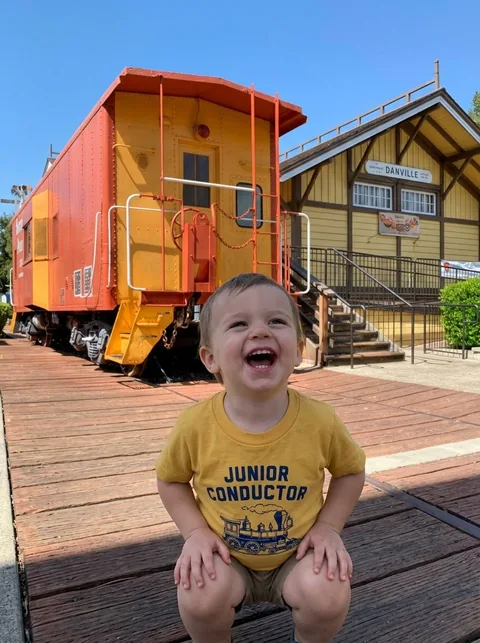 Digital visualization of Danville Depot Junior Conductor Toddler Tee on a toddler tee